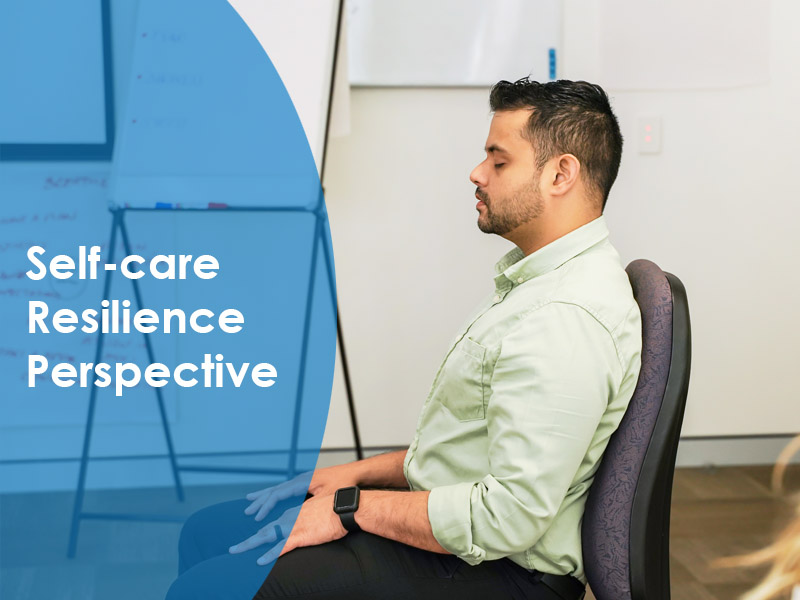 A person sitting on the chair with their eye closed practising mindfulness with the words self-care, resilience, perspective written next to them representing wellness training