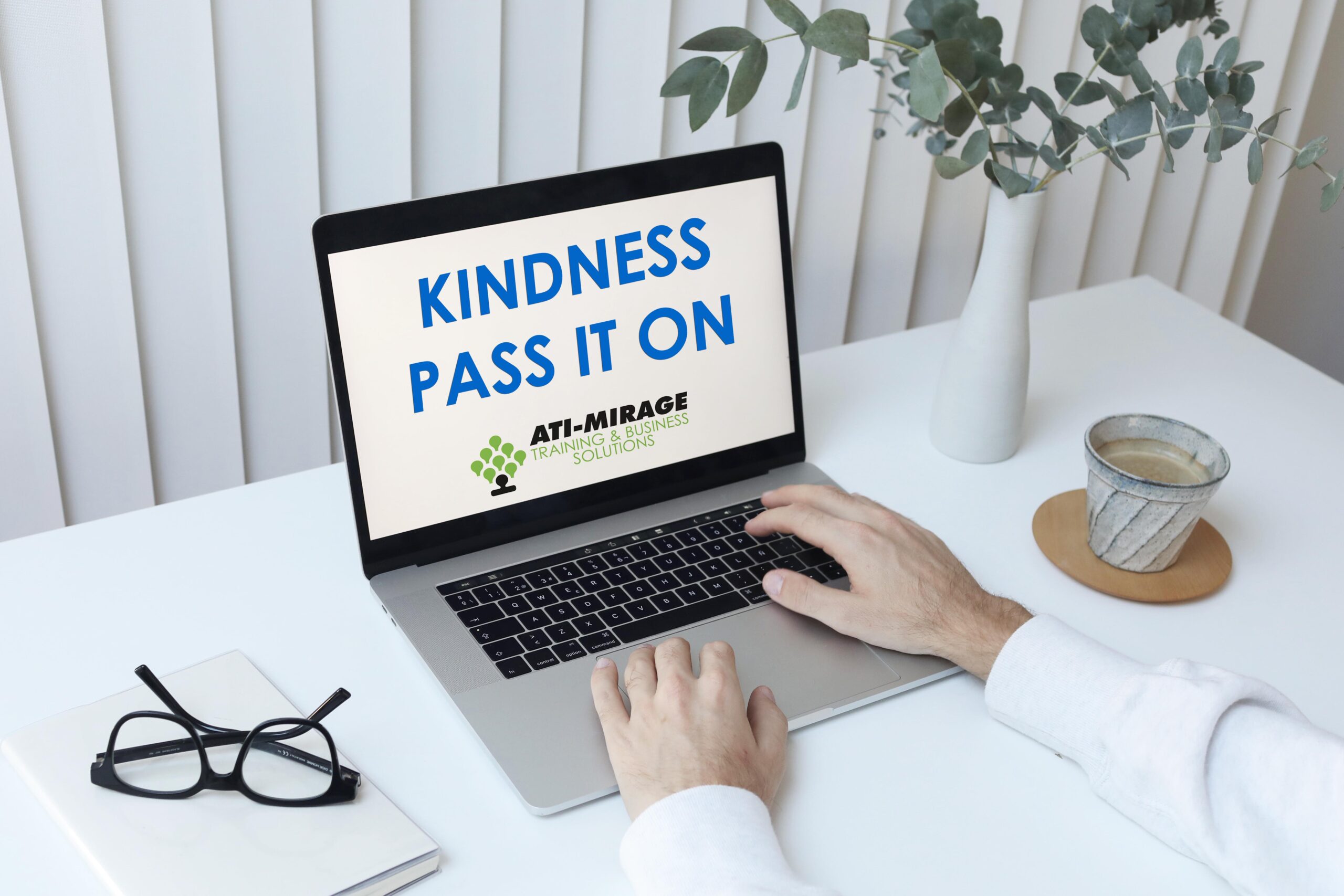 Kindness Pass It On message on the computer screen