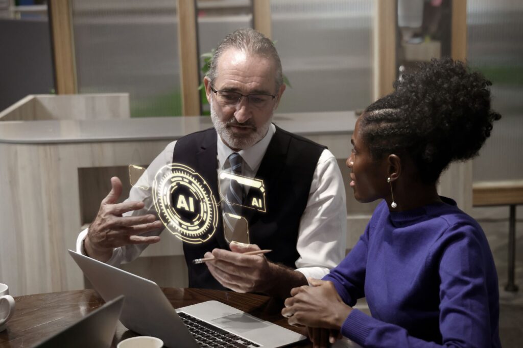 Two team members are having discussion about AI.