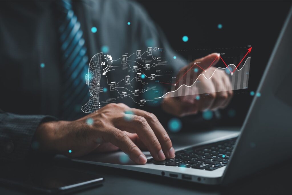 AI data floating or projecting in front of a laptop and a user.