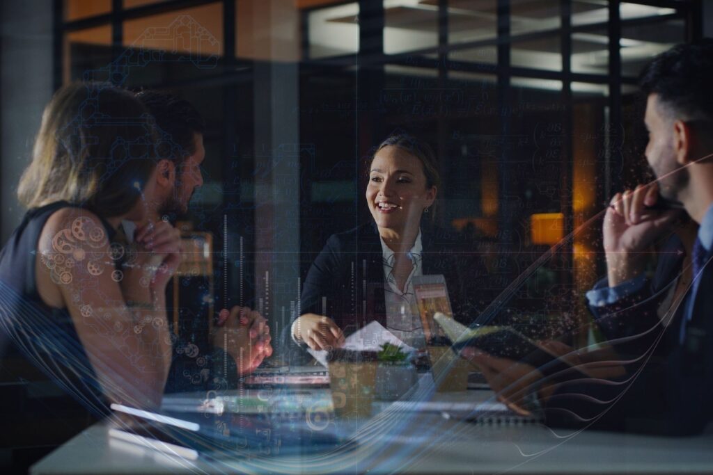 A group of people in an AI leadership meeting.