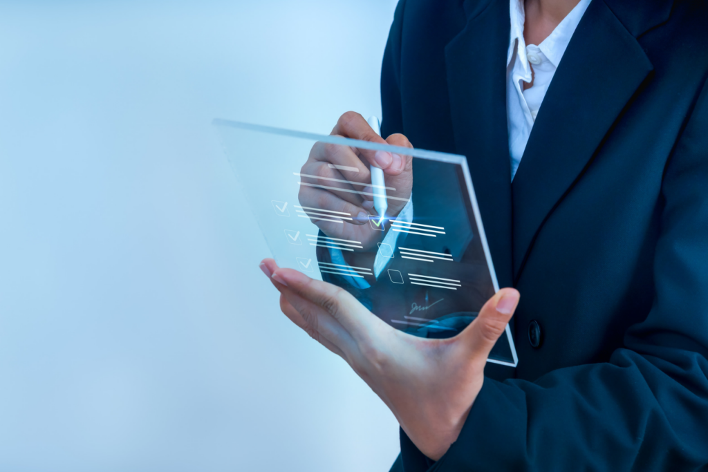 Manager holding a new ai device, touch screen device.